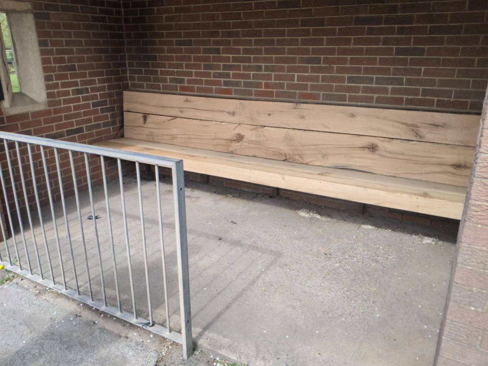 Repaired bus shelter, after October vandalism